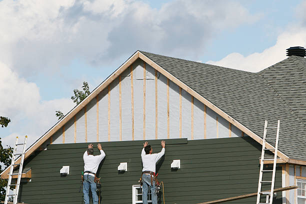 Professional Siding Contractor technician working in Rushville, IL